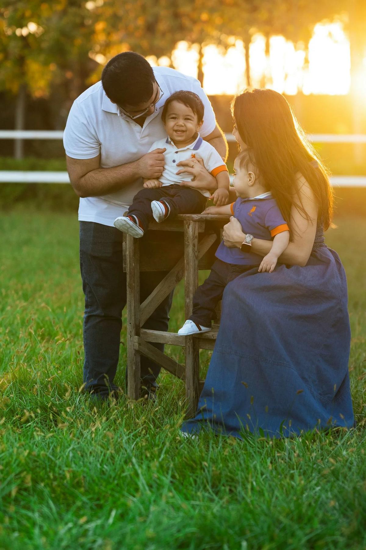 Family outdoors at sunset